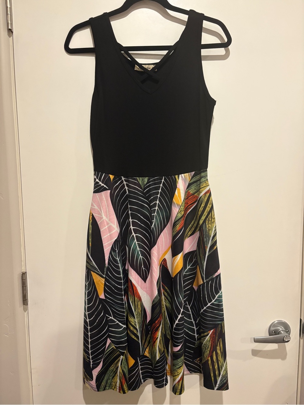 Black Sleeveless Dress with Multicolor Leaf-Print Skirt
